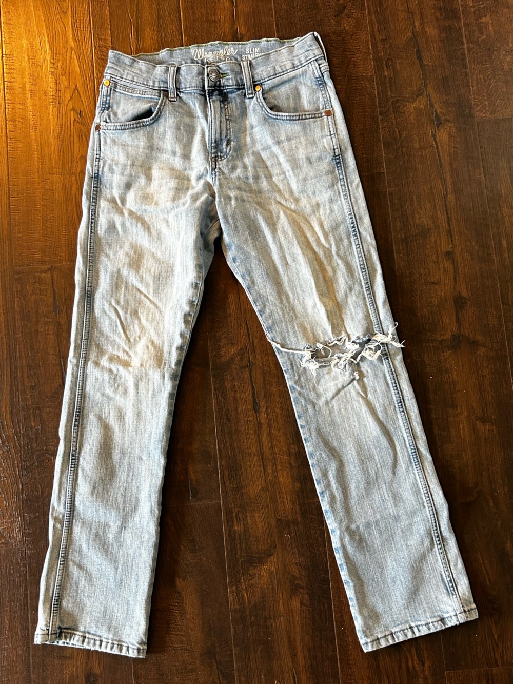 Wrangler Light Blue Slim Jeans with Distressed Knee